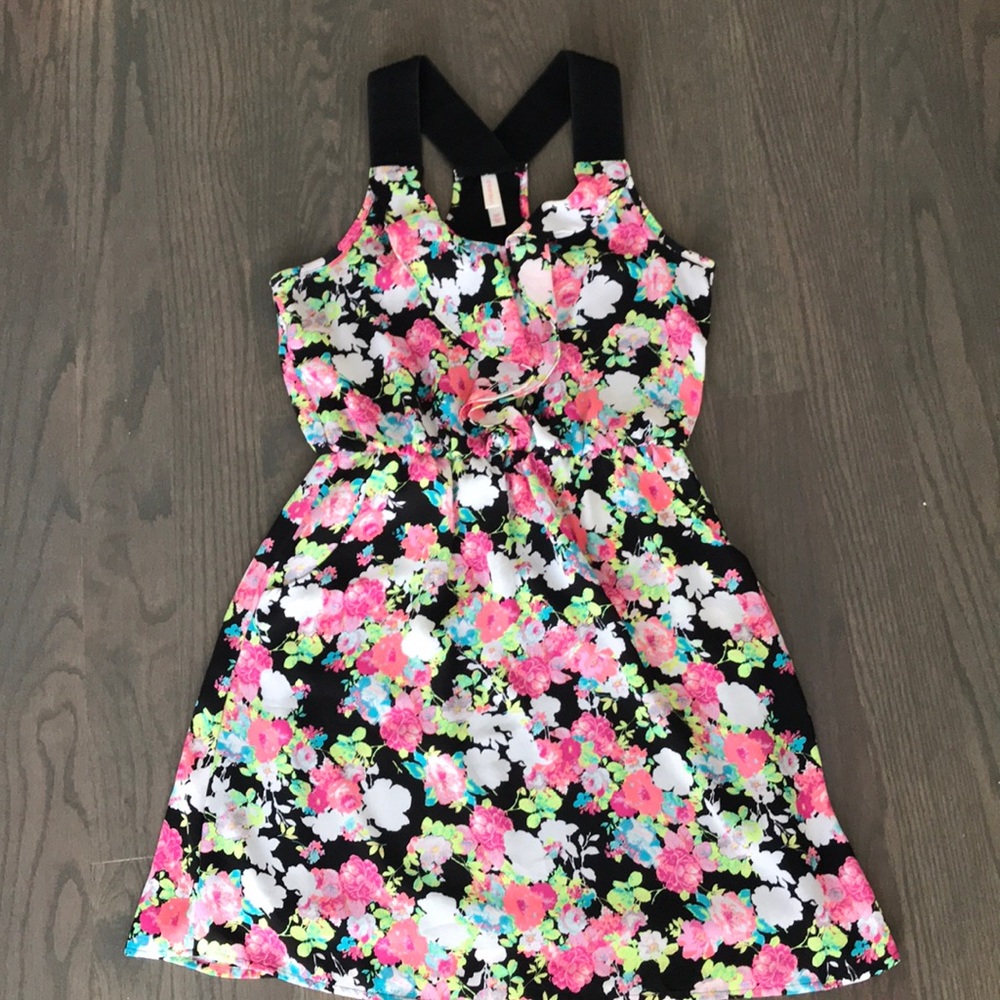 Racer back, pockets, floral dress. Size small.
